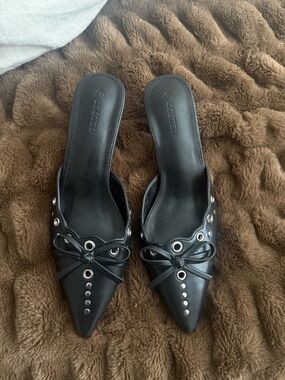 Black Pointed Toe Slip-On Mules with Grommet Detail